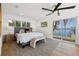 Main bedroom with water views and sliding glass doors at 475 Island Way, Clearwater Beach, FL 33767