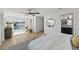 Main bedroom with pool view and sitting area at 475 Island Way, Clearwater Beach, FL 33767