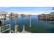 Scenic waterfront view with boats and docks at 475 Island Way, Clearwater Beach, FL 33767