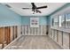 Under renovation bedroom with new wood flooring and ceiling fan at 6323 Grande Bayou Blvd, St Petersburg, FL 33702