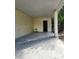 Covered patio with access to storage and backyard at 7101 Carlow St, New Port Richey, FL 34653