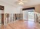 Bedroom under renovation, showing exposed framing and flooring at 1 Marina Ter, Treasure Island, FL 33706