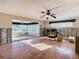 Under renovation, sunroom view, hardwood floors at 1 Marina Ter, Treasure Island, FL 33706