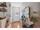 Bright entryway with decorative console table and shelving at 11117 Bloomington Dr, Tampa, FL 33635