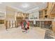 Kitchen undergoing renovation with new cabinets and exposed framing at 131 Toledo Ne Way, St Petersburg, FL 33704