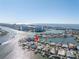 Aerial view of waterfront property with private dock at 15 Marina Ter, Treasure Island, FL 33706