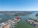 High-angle view of a house on the water, featuring a private dock at 15 Marina Ter, Treasure Island, FL 33706