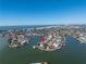 Aerial view of house on a peninsula with water access at 15 Marina Ter, Treasure Island, FL 33706