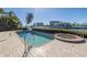 Inviting pool and spa area with brick pavers at 15 Marina Ter, Treasure Island, FL 33706