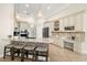 Modern kitchen featuring granite countertops and ample cabinet space at 15435 27Th E Ct, Parrish, FL 34219