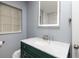 Bathroom with marble-topped vanity and LED mirror at 2621 13Th N St, St Petersburg, FL 33704