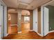 Hardwood floor hallway with arched doorways leading to other rooms at 2621 13Th N St, St Petersburg, FL 33704