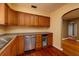 Kitchen with wood cabinets and stainless steel appliances at 2621 13Th N St, St Petersburg, FL 33704