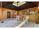 Covered patio with brick pavers and seating at 2621 13Th N St, St Petersburg, FL 33704
