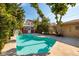 Inviting kidney-shaped pool in backyard at 2621 13Th N St, St Petersburg, FL 33704