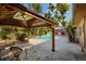 Relaxing pool area with pergola and shed at 2621 13Th N St, St Petersburg, FL 33704