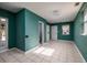 Empty spare room with green walls and tile floor at 2621 13Th N St, St Petersburg, FL 33704