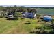 Property overview showing house, yard, and outbuildings at 3111 Lewis Rd, Dover, FL 33527