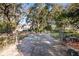 Large paved patio area in the backyard at 3111 Lewis Rd, Dover, FL 33527
