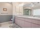 Double vanity bathroom with a separate shower and toilet at 3111 Lewis Rd, Dover, FL 33527