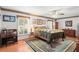 Spacious bedroom with wood flooring and a ceiling fan at 3111 Lewis Rd, Dover, FL 33527