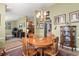 Charming dining room with wooden table and chandelier at 3111 Lewis Rd, Dover, FL 33527