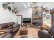 Spacious living room with leather sofas and brick fireplace at 3111 Lewis Rd, Dover, FL 33527