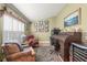 Bright home office features a large desk and window seat at 3111 Lewis Rd, Dover, FL 33527
