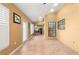 Sunroom with tile floor, brick wall, and view of backyard at 3111 Lewis Rd, Dover, FL 33527