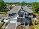Stunning two-story home featuring stone accents, covered entry, and a beautifully landscaped front yard at 3509 W Leona St, Tampa, FL 33629