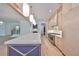 A kitchen features a large island and stainless steel appliances, promoting modern living at 3509 W Leona St, Tampa, FL 33629
