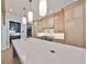 The kitchen features a large island, stainless appliances, and plenty of storage at 3509 W Leona St, Tampa, FL 33629