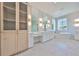 This main bathroom features double sinks, a large soaking tub, and a glass shower at 3509 W Leona St, Tampa, FL 33629