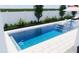 Relaxing rectangular pool with surrounding patio at 3509 W Leona St, Tampa, FL 33629