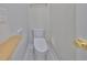 This small bathroom includes a toilet and towel rack at 3509 W Leona St, Tampa, FL 33629