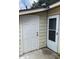 Exterior view showing storage and a side entrance at 502 Calhoun Ave, Seffner, FL 33584