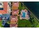 Aerial view of condominium complex, landscaping, pool and waterfront access at 6180 Sun Blvd # 204, St Petersburg, FL 33715