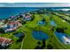 Aerial view of community with golf course and waterfront at 6180 Sun Blvd # 204, St Petersburg, FL 33715