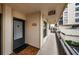 Interior hallway with condo unit entrance and exit sign at 6180 Sun Blvd # 204, St Petersburg, FL 33715