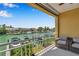 Peaceful balcony overlooking the water with seating and great views at 1069 Pinellas Bayway S, Tierra Verde, FL 33715