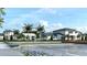 Modern community clubhouse with ample parking at 11170 Livewell Ct, Venice, FL 34293