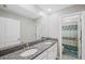 Clean bathroom with double vanity and shower/tub combo at 11321 Chilly Water Ct, Riverview, FL 33569