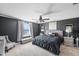 Main bedroom with king-size bed and large window at 11321 Chilly Water Ct, Riverview, FL 33569
