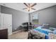 Cozy bedroom featuring ceiling fan and ample space for furniture at 11321 Chilly Water Ct, Riverview, FL 33569