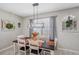 Dining area with a rustic table and fall decor at 11321 Chilly Water Ct, Riverview, FL 33569