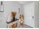 Inviting entryway with a console table and autumnal decor at 11321 Chilly Water Ct, Riverview, FL 33569