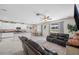 Open concept kitchen with island and white cabinets at 11321 Chilly Water Ct, Riverview, FL 33569