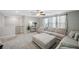 Spacious loft area with sectional sofa and ceiling fan at 11321 Chilly Water Ct, Riverview, FL 33569