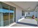 Covered patio with sliding glass door access at 11321 Chilly Water Ct, Riverview, FL 33569