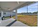 Covered patio with ceiling fan and backyard view at 11321 Chilly Water Ct, Riverview, FL 33569